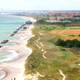 El paisaje danés es llano y está caracterizado por tierras de cultivo y costas arenosas. Wikimedia Commons